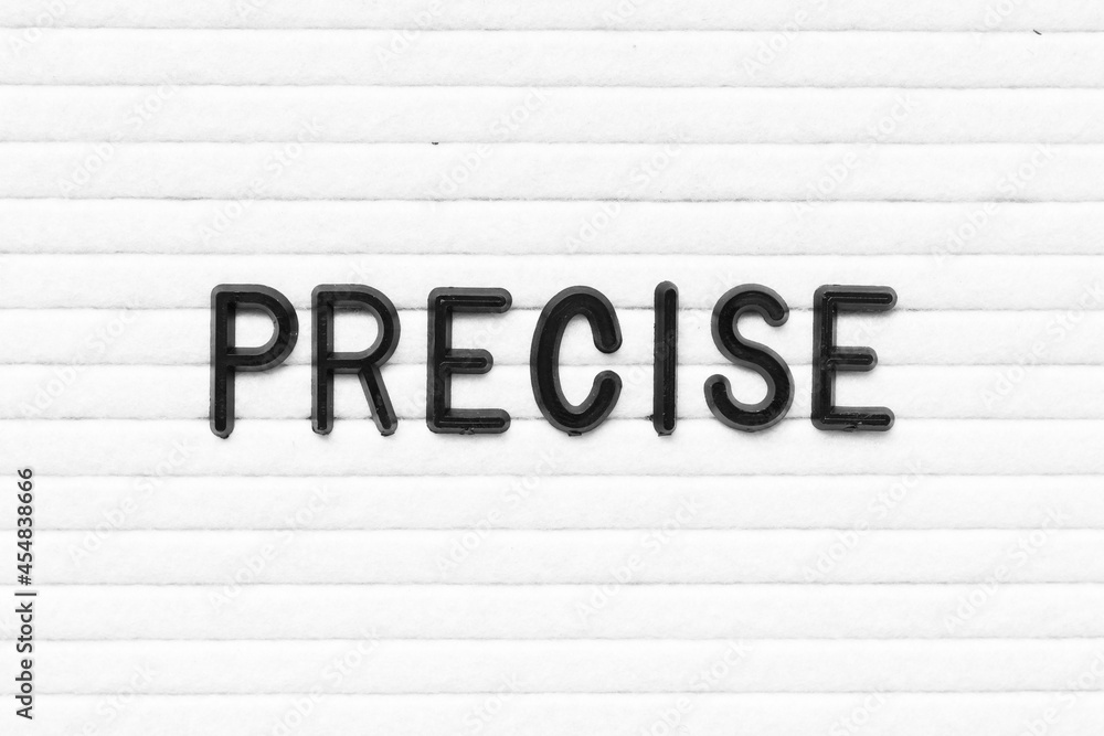 Black letter in word precise on white felt board background Black letter in word precise on white felt board background
