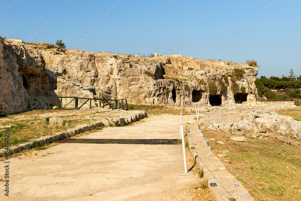 Sceneries of The Street of Tombs ( Via dei Sepolcri) in The Neapolis Archaeological Park in Syracuse, Sicily, Italy.