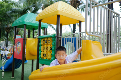 slider for child. playground. activity for kid.  © waranyu