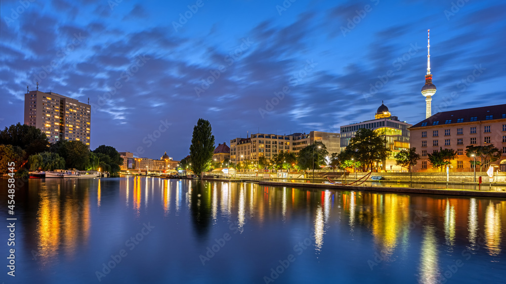 The river Spree in downtown Berlin with the famous TV Tower at night