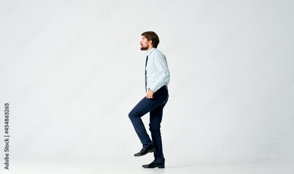 business man in shirt with tie emotions gestures with hands light background business man in shirt with tie emotions gestures with hands light background