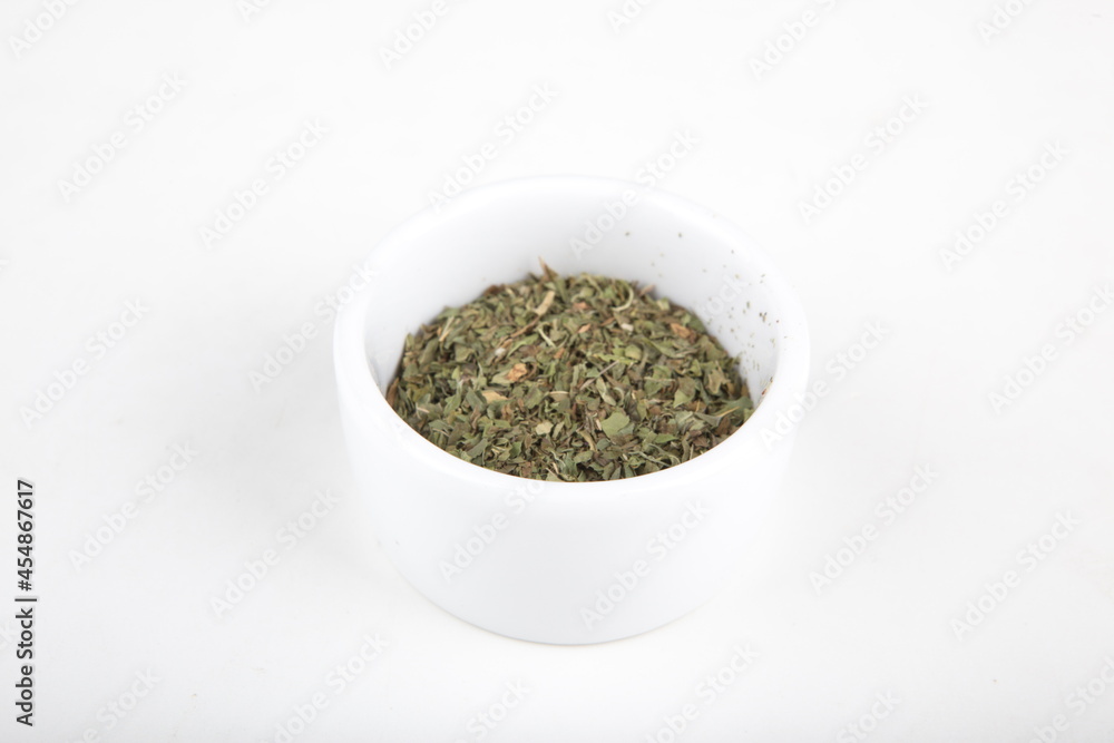 tea leaves for brewing in a white cup tea leaves for brewing in a white cup