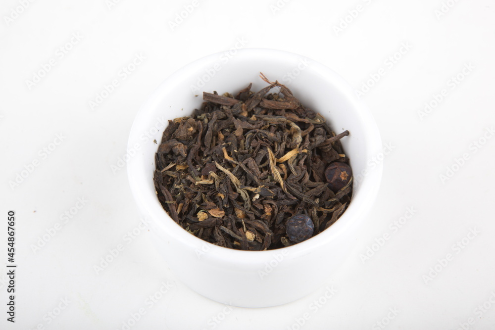tea leaves for brewing in a white cup tea leaves for brewing in a white cup