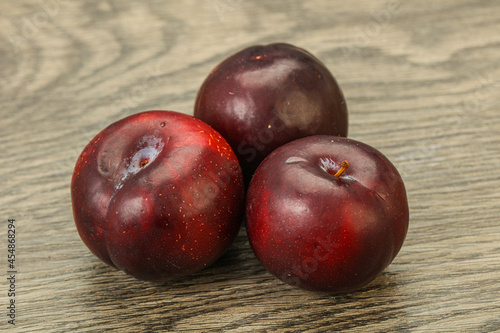 Ripe sweet plum fruit heap