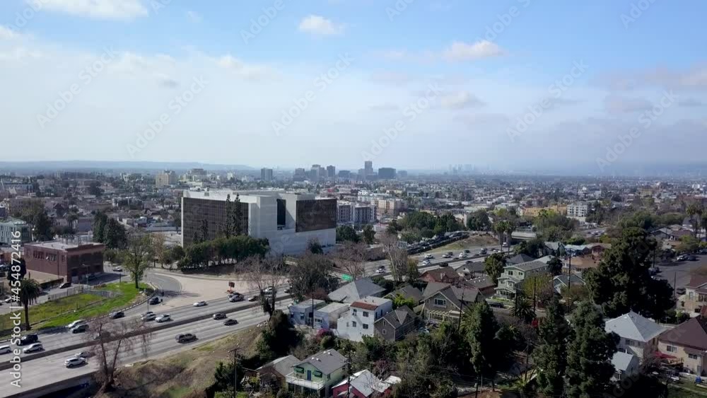 Aerial flying above a neighborhood next to the busy Hollywood freeway in Los Angeles. Aerial flying above a neighborhood next to the busy Hollywood freeway in Los Angeles.
