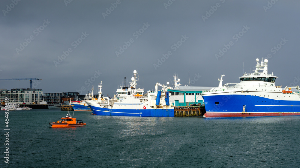 Trawlers and rescue boat in Reykjavik harbor, Iceland. Trawlers and rescue boat in Reykjavik harbor, Iceland.