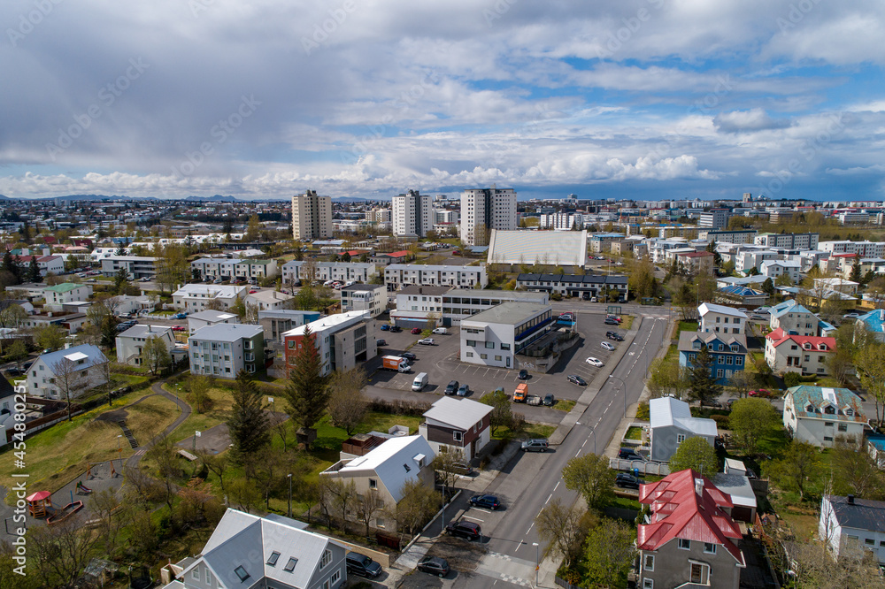 Fototapeta premium Aerial peaceful modern town with residential buildings