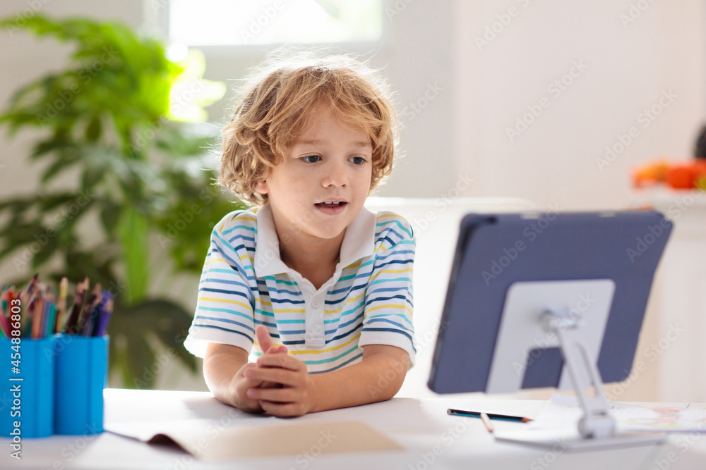 Online remote learning. School kids with computer. Online remote learning. School kids with computer.