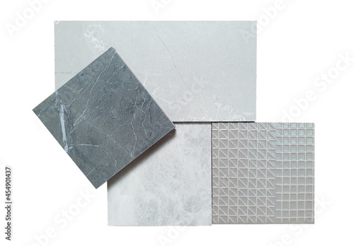 interior stone and pattern tile samples consists grey emperado marble  black marble  graphic pattern textures isolated on white background with clipping path. floor or wall tile collection.