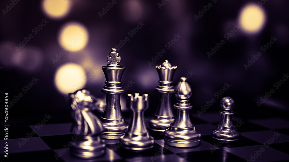 Closeup of chess characters on board games. to represent decision making in term of business strategy to find out the best solution to meet target objective and goal.	
