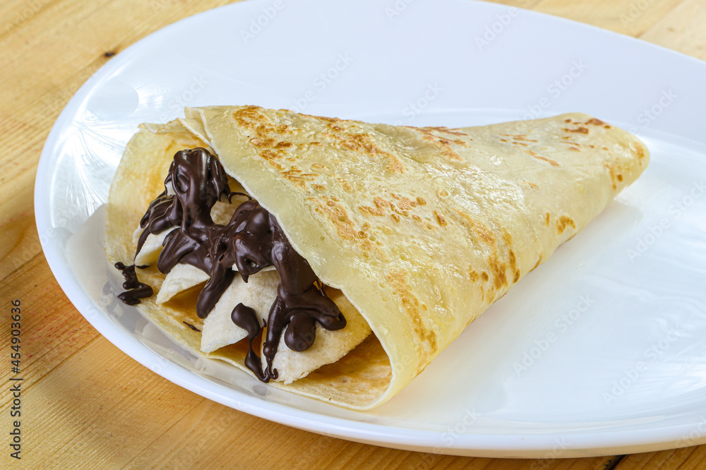 Pancake with banana and chocolate