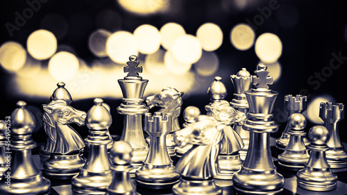 Closeup of chess characters on board games. to represent decision making in term of business strategy to find out the best solution to meet target objective and goal.  