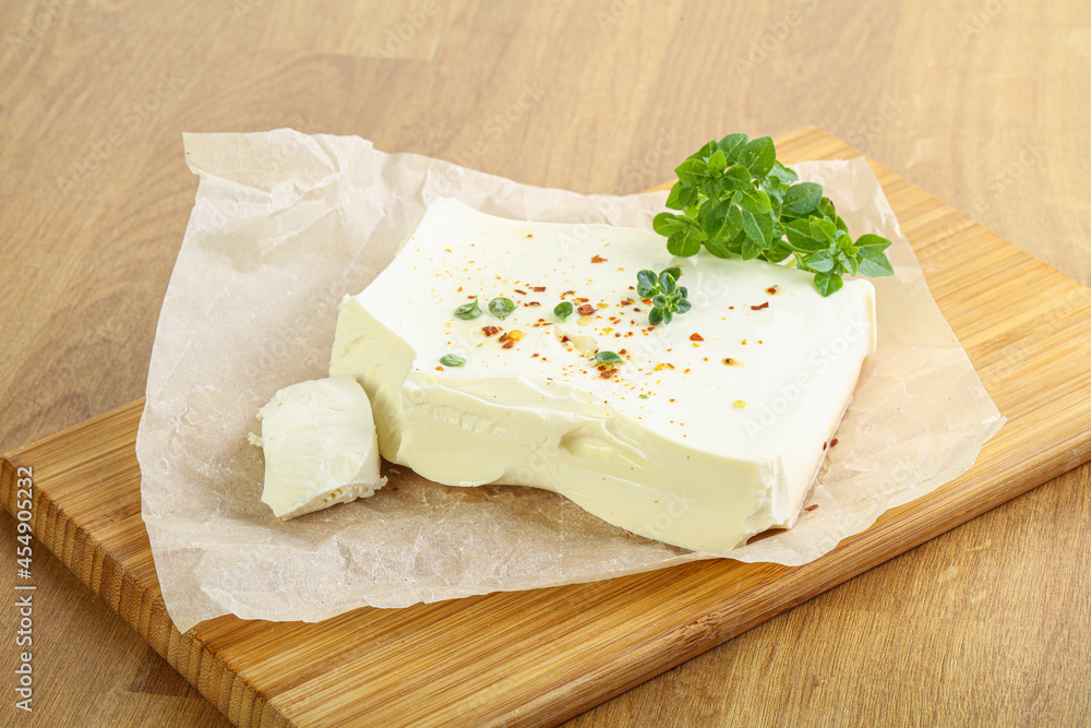 Greek Feta cheese over board