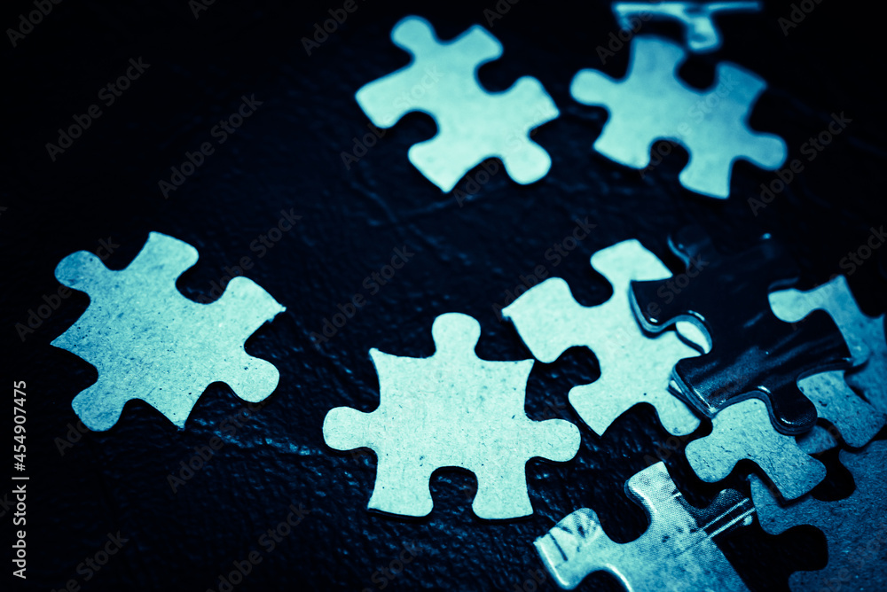 jigsaw puzzle on wooden background. to represent how complexity in game and challenge. plan and goal as concept.
jigsaw puzzle on wooden background. to represent how complexity in game and challenge. plan and goal as concept.