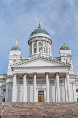 Low angle view of Helsinki Cathedral (Finnish - Helsingin tuomiokirkko, Suurkirkko). The Finnish Evangelical Lutheran cathedral of the Diocese of Helsinki on a sunny summer day.  © Aimur