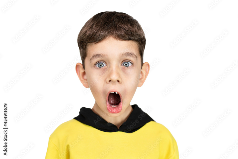 On a white background, a little preschool boy 5-8 years old with surprise and emotions of admiration screams, isolated. Blank for advertising On a white background, a little preschool boy 5-8 years old with surprise and emotions of admiration screams, isolated. Blank for advertising