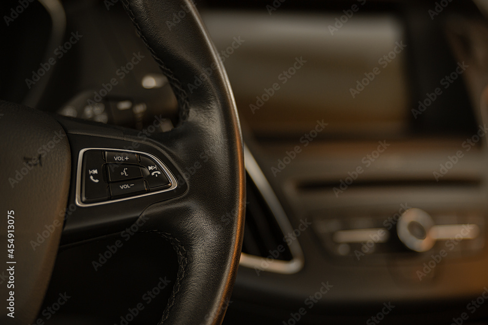 Multimedia control and smartphone control buttons on the car steering wheel