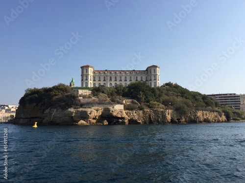 View of the Pharo Palace and its gardens in Marseille, France, as seen from the sea. The palace was built in 1858 by Emperor Napoleon III for Empress Eugénie. photo