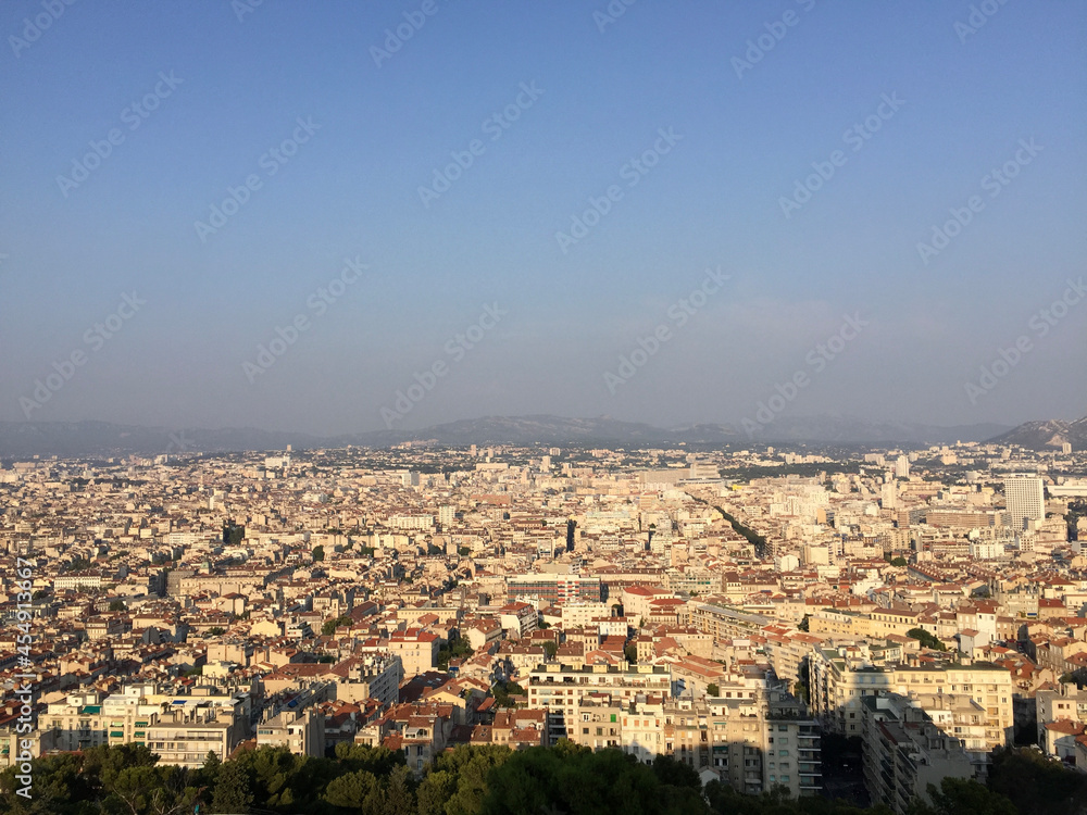 Panoramic view of Marseille's eastern neighborhoods, seen from the Notre-Dame de la Garde basilica in Marseille, France.