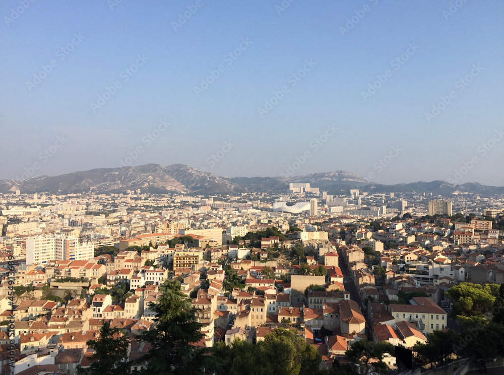 Panoramic view of Marseille's southern neighborhoods with the the Massif de Saint-Cyr in the background, seen from the Notre-Dame de la Garde basilica in Marseille, France.