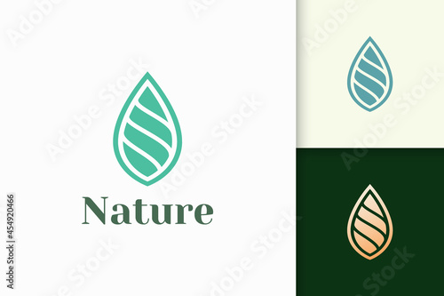 Beauty or health logo in simple leaf shape represent nature