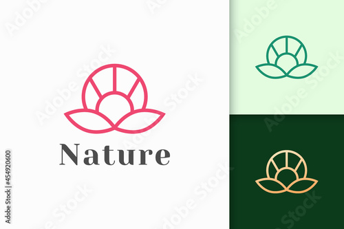 Flower logo in feminine and luxury style for health and beauty