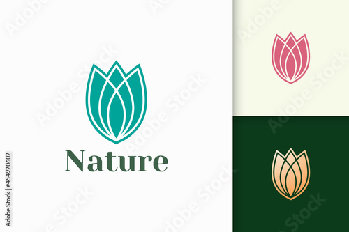 Flower logo in abstract and luxury style for health and beauty