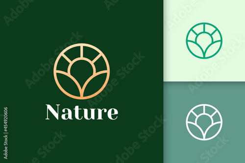 Circle flower logo in simple and luxury style for health and beauty