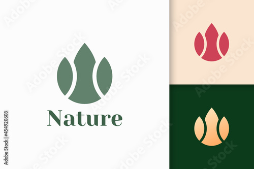 Abstract flower logo in simple and luxury style for health and beauty
