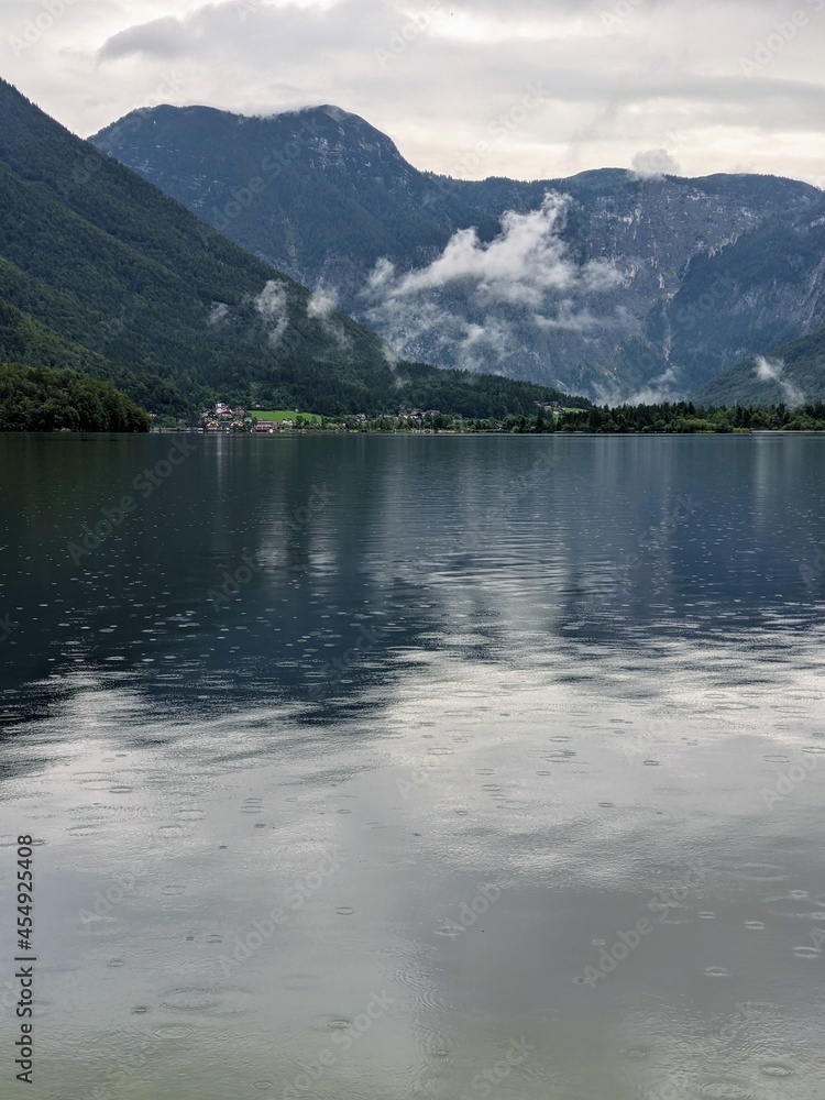 Alpine lake Hallstatter See during rain travel destination