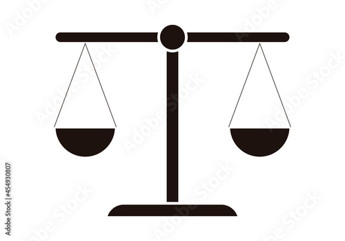 Icono negro de una balanza en fondo blanco.