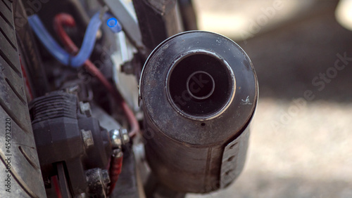 Close up view of a motorcycle exhaust pipe