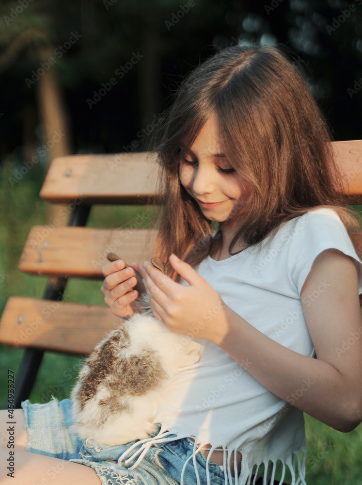 Friendship between child and animal concept. Rabbit symbol of Easter. Friendship between child and animal concept. Rabbit symbol of Easter.