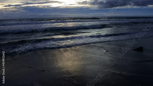 footage of dusk at label matahari terbit beach, bali photo