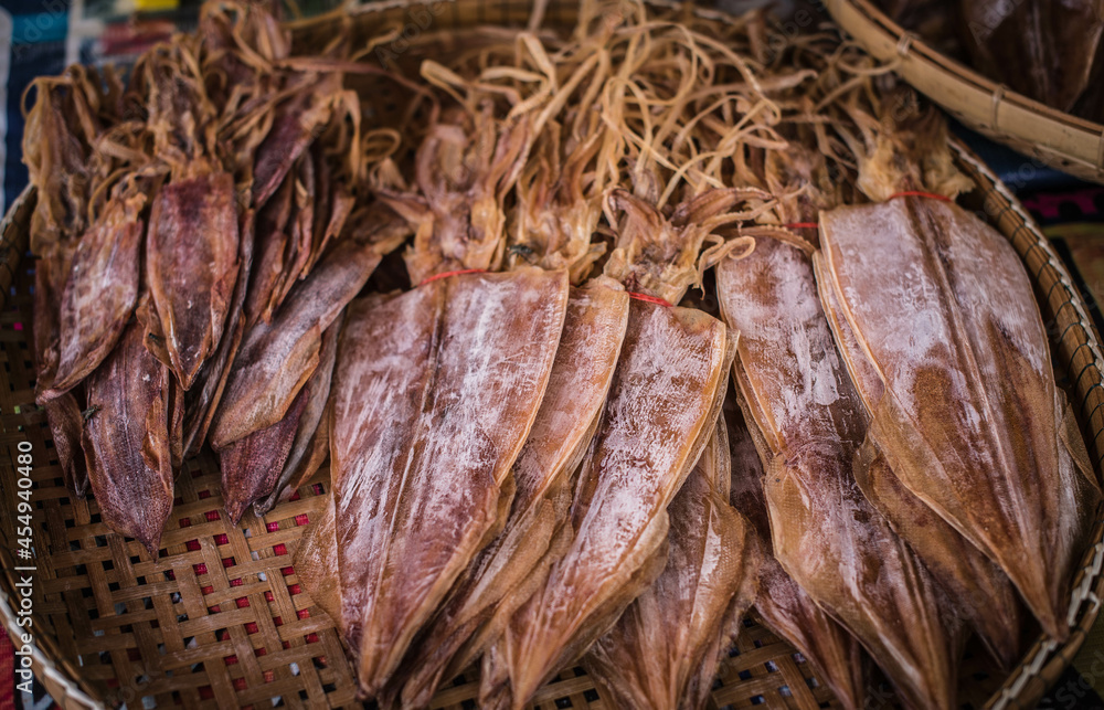 Dried squids are sold in a seafood market at Laem Chabang Fishing Village, Thailand.