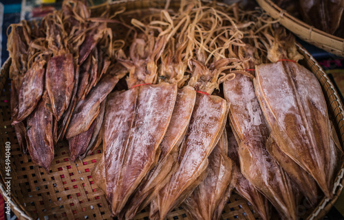 Dried squids are sold in a seafood market at Laem Chabang Fishing Village, Thailand. photo