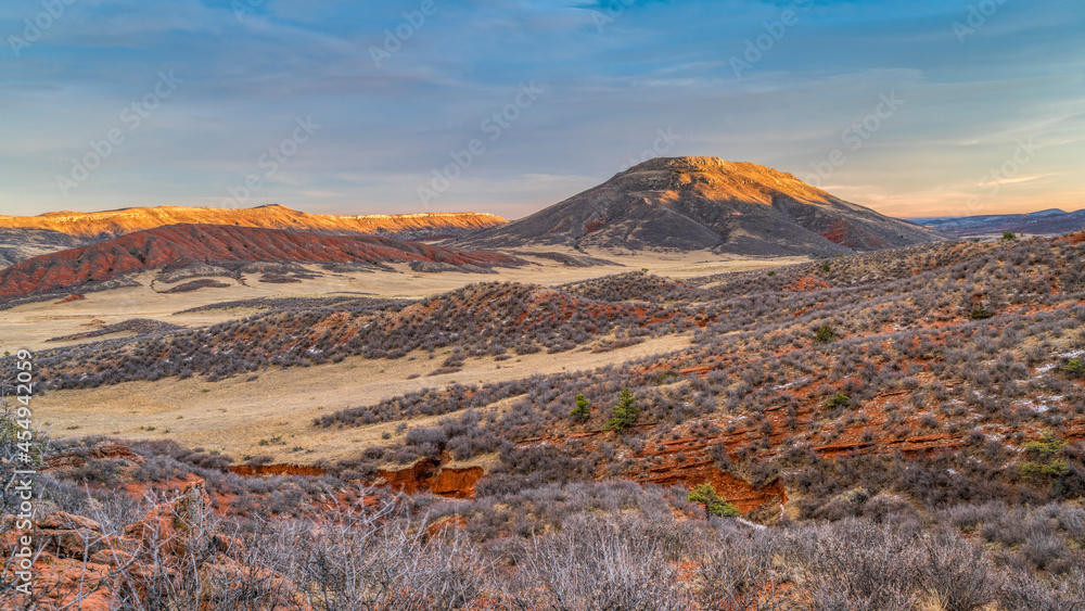 November sunset over Red Mountain Open Space in northern Colorado as seen from K-Lynn Cameron Trail November sunset over Red Mountain Open Space in northern Colorado as seen from K-Lynn Cameron Trail