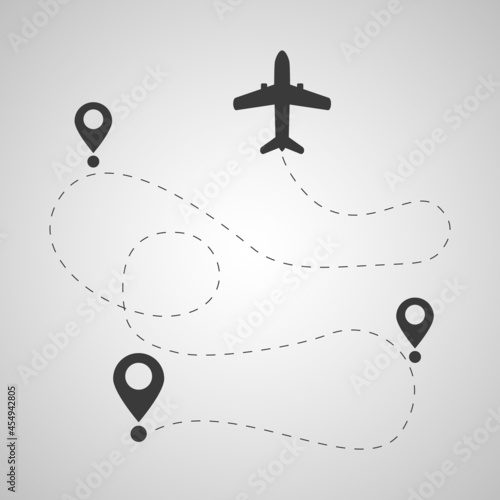 An imaginary flight path of an airplane with dotted lines and pins.