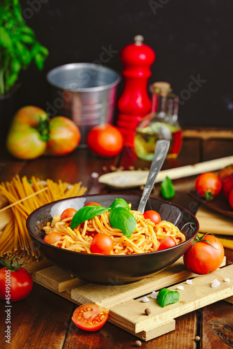 Spaghetti with meat  tomatoes and basilium