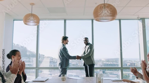 business people shaking hands in boardroom meeting successful corporate partnership deal with colleagues clapping hands welcoming opportunity for cooperation in office 4k photo