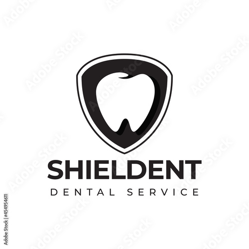 shieldent dental service logo, simple shield wth negaive space of tooth vector