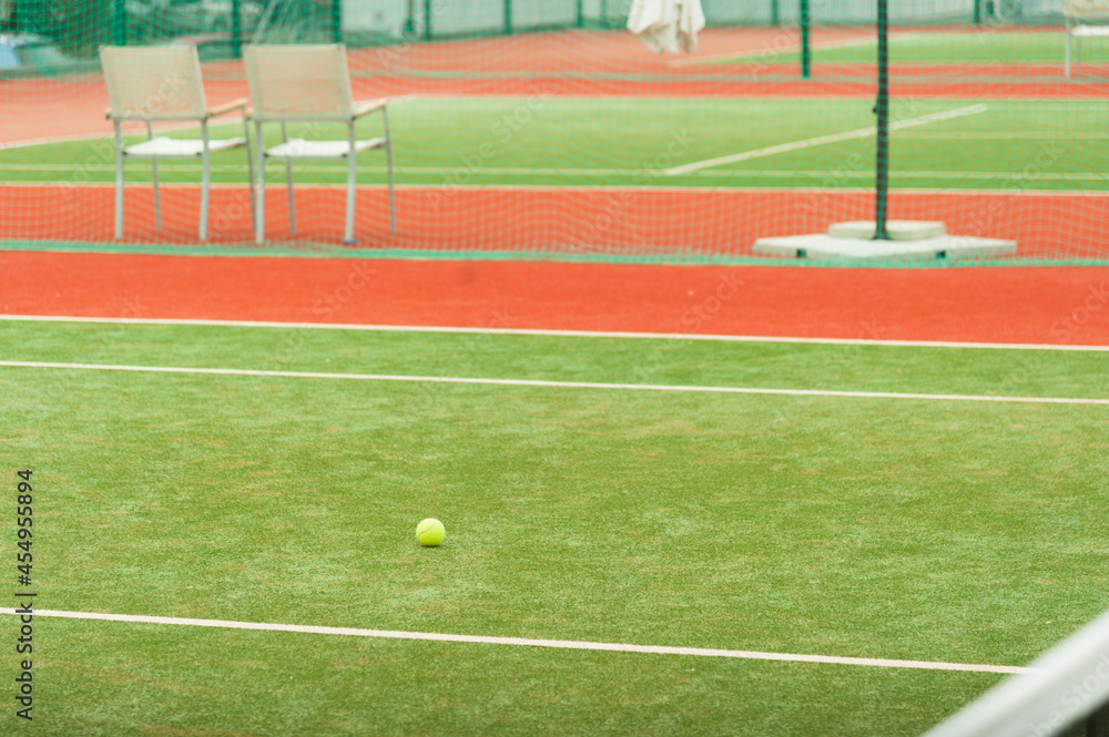 Fototapeta premium Empty green tennis court ready for competition, no people.