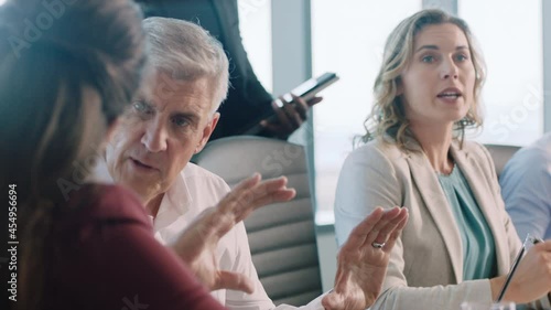 Wallpaper Mural corporate business people meeting in boardroom brainstorming colleagues discussing strategy sharing problem solving ideas working on deadline collaborating in busy office 4k Torontodigital.ca