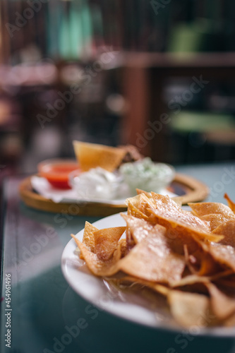 Tortilla chips in Mexican restaurant closeup