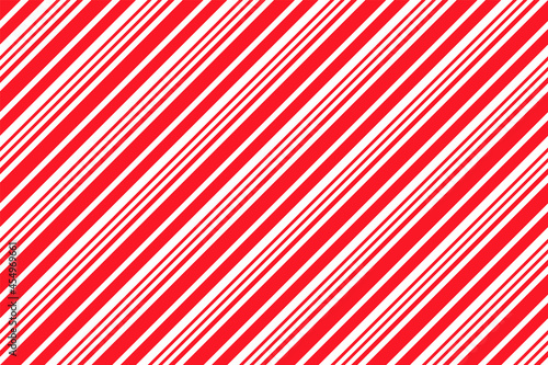 Candy cane seamless pattern. Christmas striped red background. Xmas prints with diagonal lines. Cute holiday wrapping paper. Abstract geometric texture. Vector illustration.