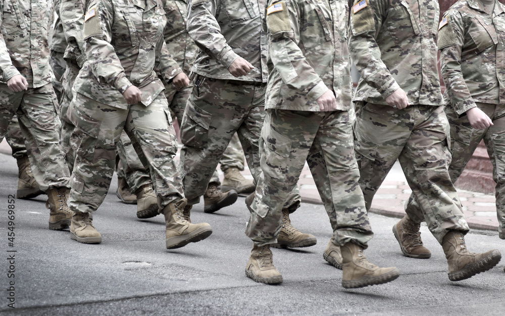 US soldiers. US army. Military forces of the United States of America. Soldiers marching on the parade. Veterans Day. Memorial Day. US soldiers. US army. Military forces of the United States of America. Soldiers marching on the parade. Veterans Day. Memorial Day.