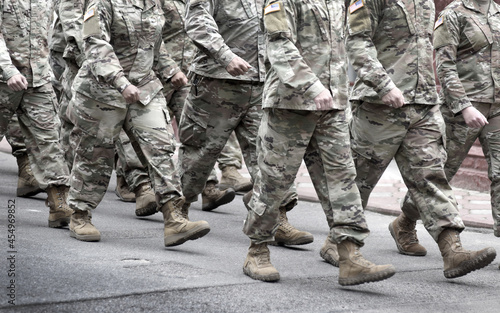 US soldiers. US army. Military forces of the United States of America.   Soldiers marching on the parade. Veterans Day. Memorial Day.