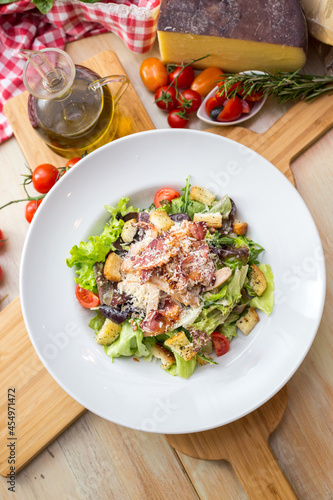 fresh salad on table with props