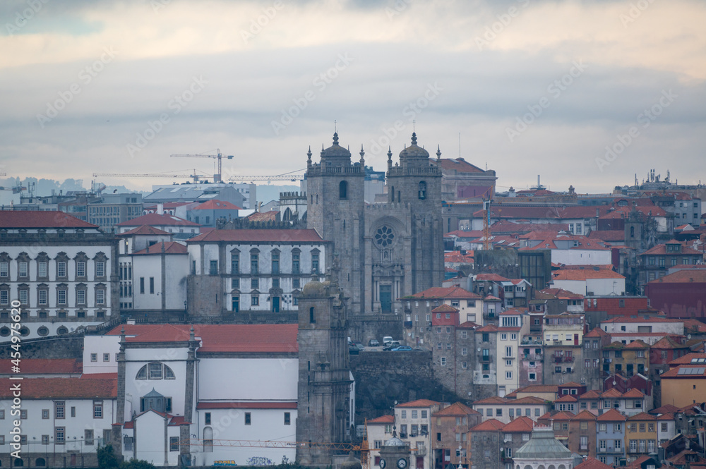 Panoramic view on Douro river and old part of Porto city in Portugal at cloudy sunrise Panoramic view on Douro river and old part of Porto city in Portugal at cloudy sunrise