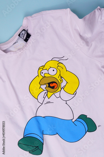 Tyumen, Russia-August 27, 2021: Simpsons on a Homer Simpson T-shirt.  American adult animated sitcom created by Matt Groening. Vertical photo  Stock Photo | Adobe Stock